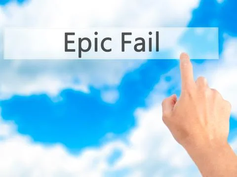 Epic Fail - Hand pressing a button on blurred background concept on visual sc 写真素材