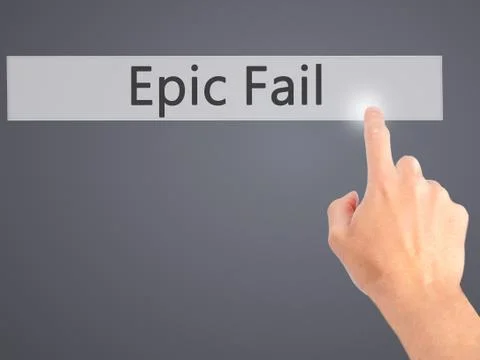 Epic Fail - Hand pressing a button on blurred background concept on visual sc 写真素材