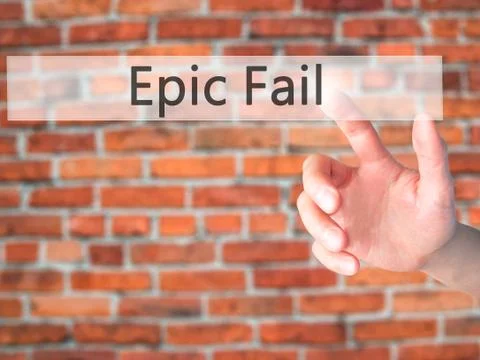 Epic Fail - Hand pressing a button on blurred background concept on visual sc Foto stock