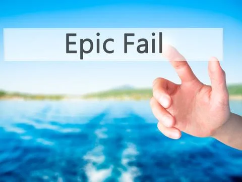 Epic Fail - Hand pressing a button on blurred background concept on visual sc Foto stock
