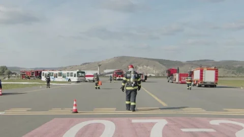 Epic Firefighter Walk in slow motion Stock Footage 233685933