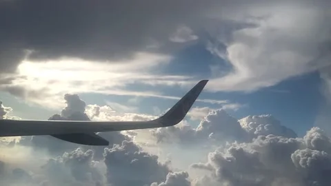 Epic Flight Above Clouds View At Airplane Wing And Cloud Cover Through Window Stock Footage 162659804