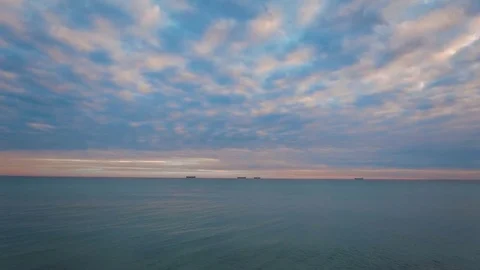 Epic flight to drone camera elevation above the sea to meet the horizon. 4K. Video stock 71096439