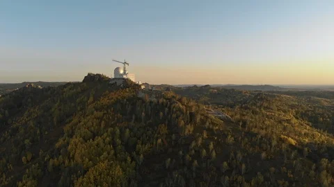 Epic flight over astronomical Observatory on top of mountain at sunset in autumn Stock Footage 124112330