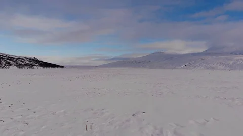 Epic Flight over snowy fields in winter, panoramic view from the air of the Video stock 106396662