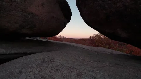 Epic Fly Slowly Between Large Boulders Elephant Rocks on Missouri Stock Footage 255914934