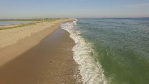 Epic flyby of the beach and waves Stock Footage 78773141