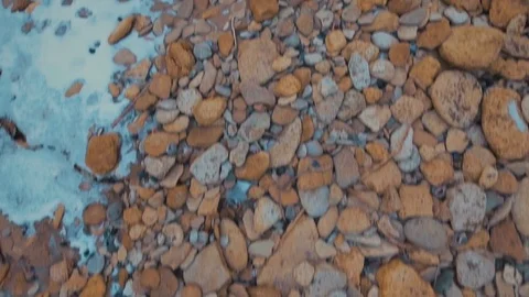 Epic flying drone to over the winter beach during a beautiful pink sunset. 4K. Stock Footage 71094790