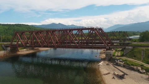 Epic flying view. bridge road. street train traffic transportation. lake river Stock Footage 90065292