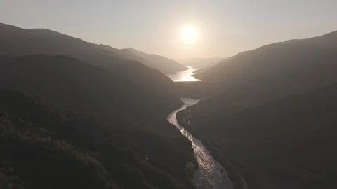 Epic Golden Sunset Above River and Endless Forest Stock Footage 337356480