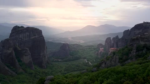 Epic Heavenly Light Holy Monastery of Rousanou Meteora Greece at Sunset. Vi.. Stock Footage 334871047