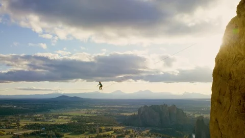 Epic Highlining at Sunset - Smith Rock - 4k Stock Footage 106363739