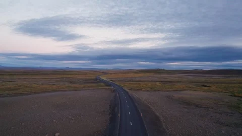 Epic Iceland Ring Road at Sunset. Aerial Moves Backwards Along Empty Road Stock Footage 256708570