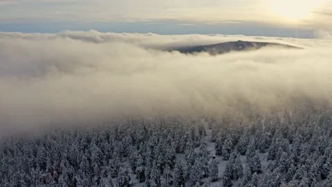 Epic inversion in mountain ridges with rocks in winter snow weather in sunset Stock Footage 141922133