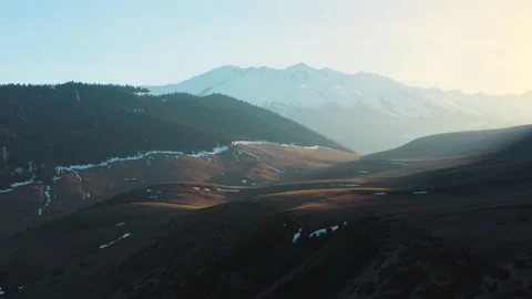 An epic landscape of a beautiful valley with fields and green forests against 스톡 동영상 159709115