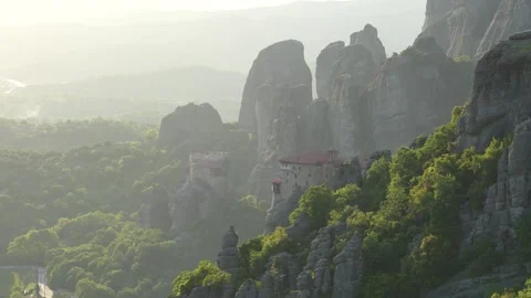 Epic Light Close View Holy Monastery of Rousanou Meteora Greece at Sunset o.. Stock Footage 334871121
