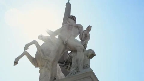 Epic low angle shot of a classical sculpture of a man and a horse in Rome, Video stock 223375175