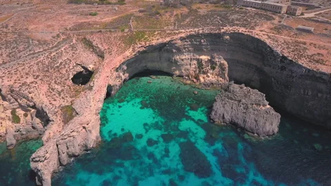Epic Malta Blue Lagoon Turquoise Sea Caves Aerial Drone Pan MA BLA 0217 A GR Stock Footage 143609873