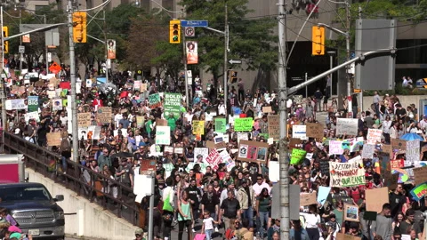 Epic massive crowds of young students Protest Climate Change In Toronto Stock Footage 141608973