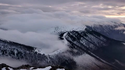 Epic Misty Mountains with Low Clouds Motion Fast in Winter evenig, timelapse Stock-Footage 325434676
