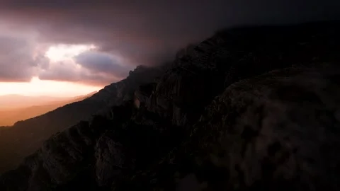 Epic Mountain Edge View Into the Sun – Mystical Hasselblad Drone Shot (6K/60) Stock-Footage 310334220