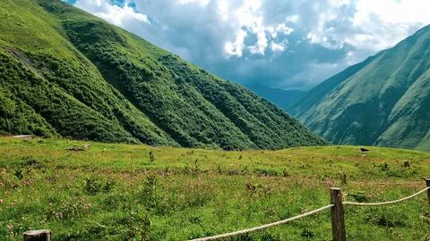 Epic mountain, gorge clouds on mountains, green summer landscape Stock Photos
