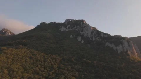 Epic Mountain Peak Giant Stone Arch Sunset 4K 60fps Video stock 337404626