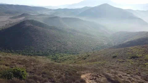 Epic Mountain Peak Revealed: Drone Hike Trail Exploration Video stock 281505713