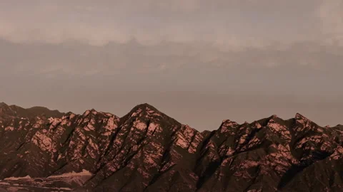 Epic Mountain Skyline Slopes Twilight Tracking Right 8K HLG Stock Footage 344015058