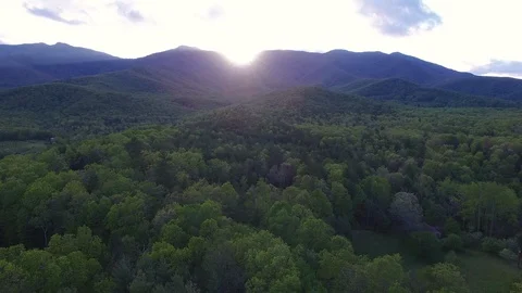 Epic Mountains with Sunet and Lense Flare Stock Footage 128545202