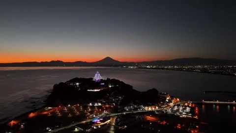 Epic Mt. Fuji Sunset | Enoshima Nightscape | Japan - 4K Aerial Video Stock Footage 329055019