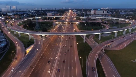 Epic night road interchange junction active traffic high-speed highway Aerial Stock Footage 116267276