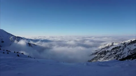 An epic ocean of clouds and fog in the mountains Stock Footage 222787072