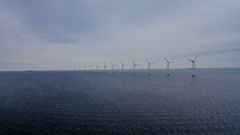 Epic offshore wind mill farm in Oresund sea from aerial drone view Stock Footage 128516558
