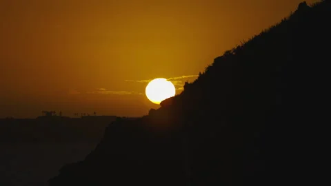 Epic orange sunset over clifs and ocean Stock Footage 263674282