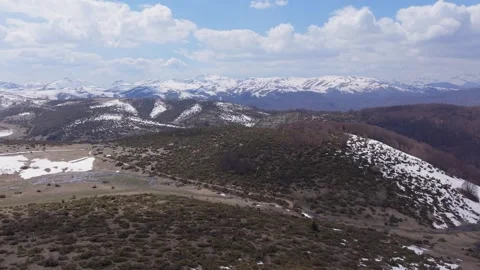 Epic Panoramic Aerial View of Snowy Mountain Ranges Stock Footage 336286894