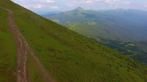 Epic panoramic  view of green grassy  mountains landscape Stock Footage 79882395
