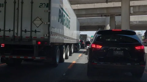 Epic POV driving plate slow moving rush hour traffic gridlock on highway Stock Footage 156060722
