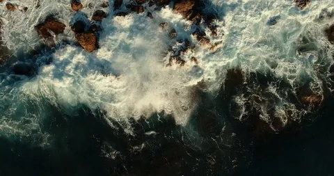 Epic, powerful, beautiful, aggressive frame. Huge waves crash against the rocks. Stock Footage 97300568