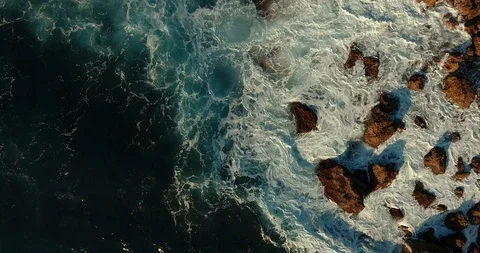 Epic, powerful, beautiful, aggressive frame. Huge waves crash against the rocks. Stock Footage 97300650
