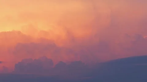 Epic red clouds moving in the rays of the setting sun. Timelapse video Stock Footage 278030660