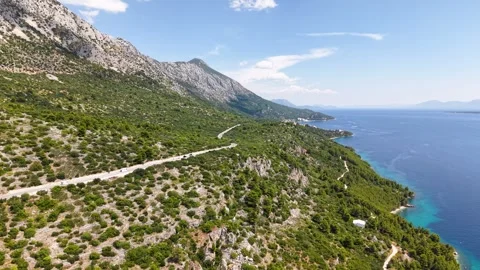 Epic road trip through the Mediterranean: A stunning high-angle shot of a Stock Footage 319436408
