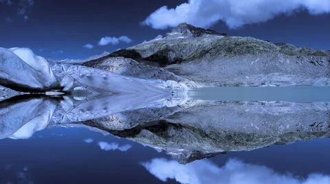 Epic scenery of mountain landscape reflecting in lake water Stock-Footage 64536887