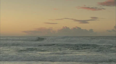 Epic seascape of waves rolling by the sea at sunset Stock Footage 37164697