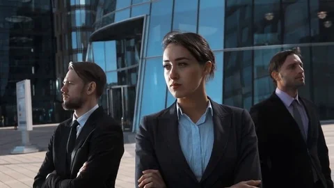 Epic shot of 3 serious business people Stock Footage