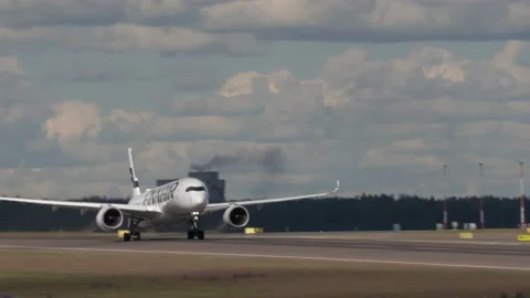 Epic shot of a plane speeding up to take off. Stock Footage 163258940