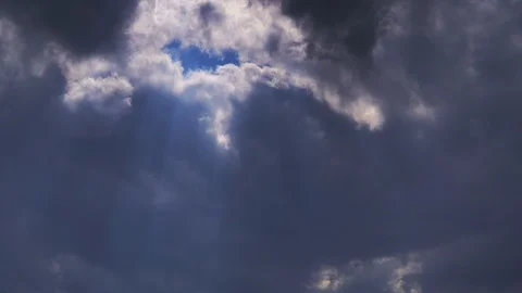 Epic sky where the sun's rays break through the clouds Stock Footage 105454423