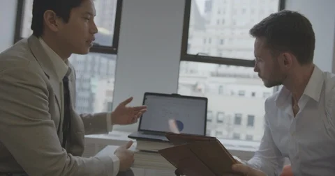 Epic slow motion shot of two businessman discussing Video stock 93367611