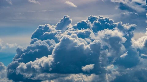 Epic storm clouds moving fast over blue ... | Stock Video | Pond5