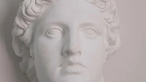 Epic studio close-up shot of a gypsum head with changing lighting. Stock-Footage 151524286
